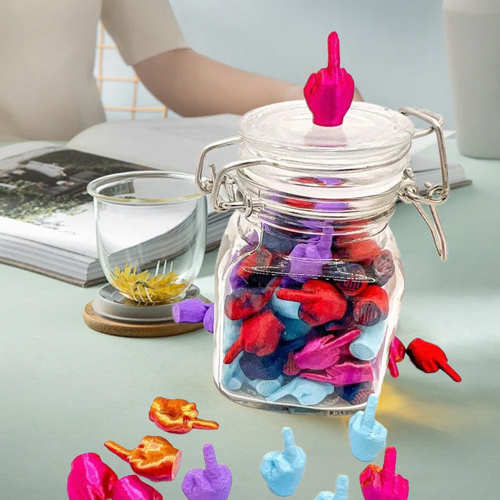 Humorous desk decor featuring a jar packed with middle finger figurines, an ideal novelty item.