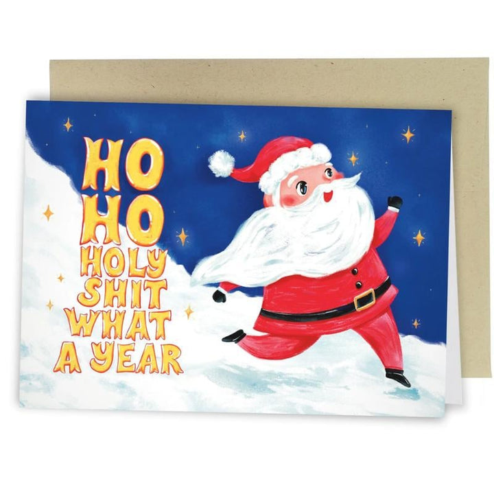 Close-up of a funny holiday card from the set, showing a specific humorous illustration and text.