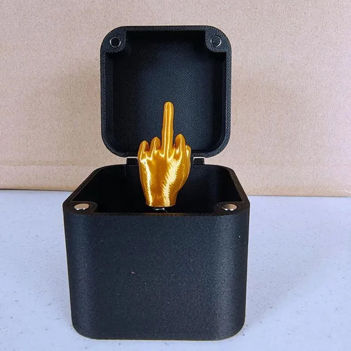 Prank Gift Box, novelty item, black and gold, for a surprising gag