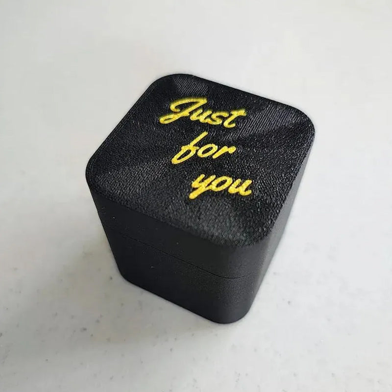 Surprise novelty prank gag gift box, perfect for office humor, black & gold