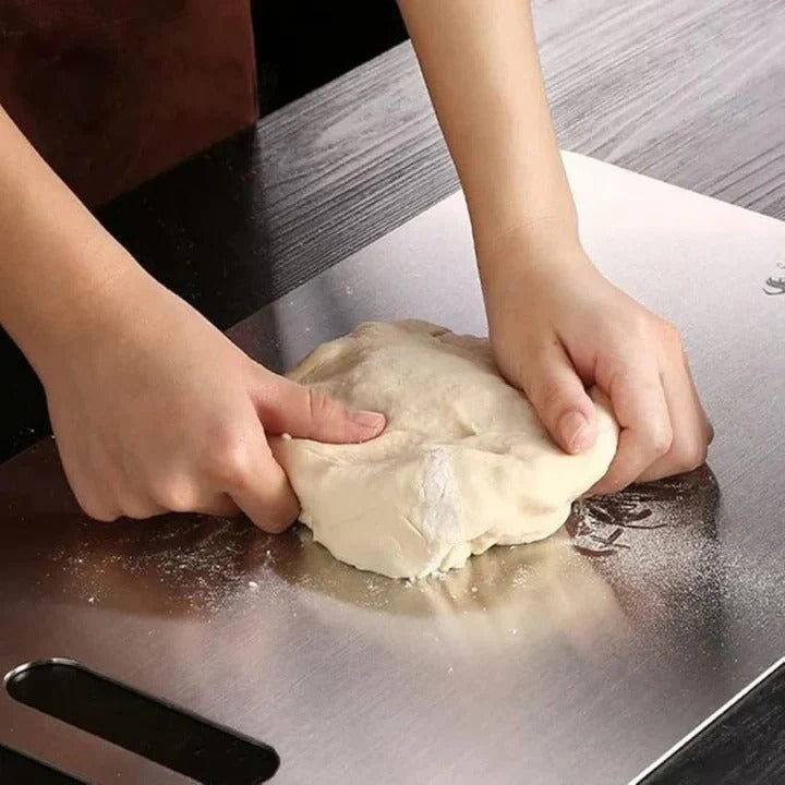 Modern titanium kitchen cutting board. Hygienic surface for safe food prep. Durable & easy to clean.