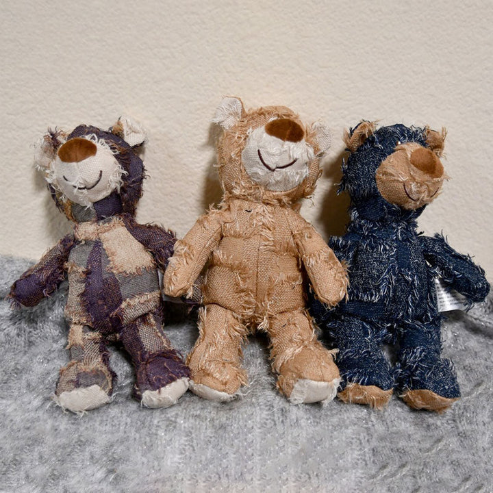 Durable bear chew toy for dogs, featuring reinforced seams for aggressive play and pet dental care.