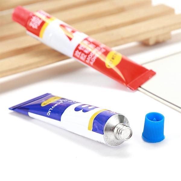 Industrial strength metal and multi-surface repair adhesive tube for strong, waterproof bonds.