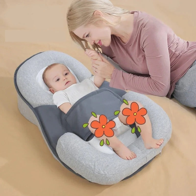 Infant anti-spit-up inclined pillow, white, supporting comfortable digestion and reflux relief for newborns.