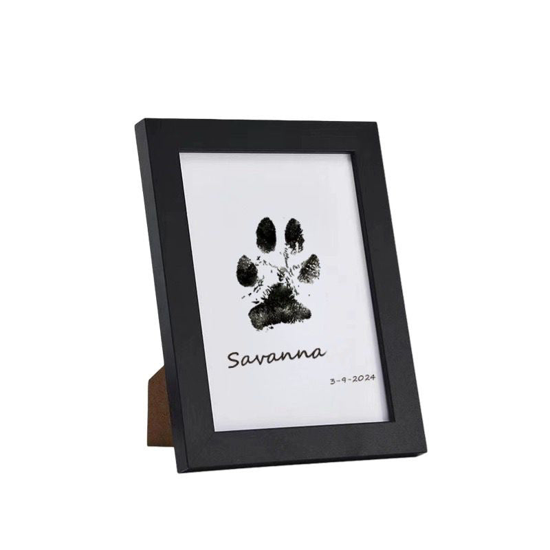 Contents of Inkless Pet Paw Print Kit: ink pad, cards, and instructions