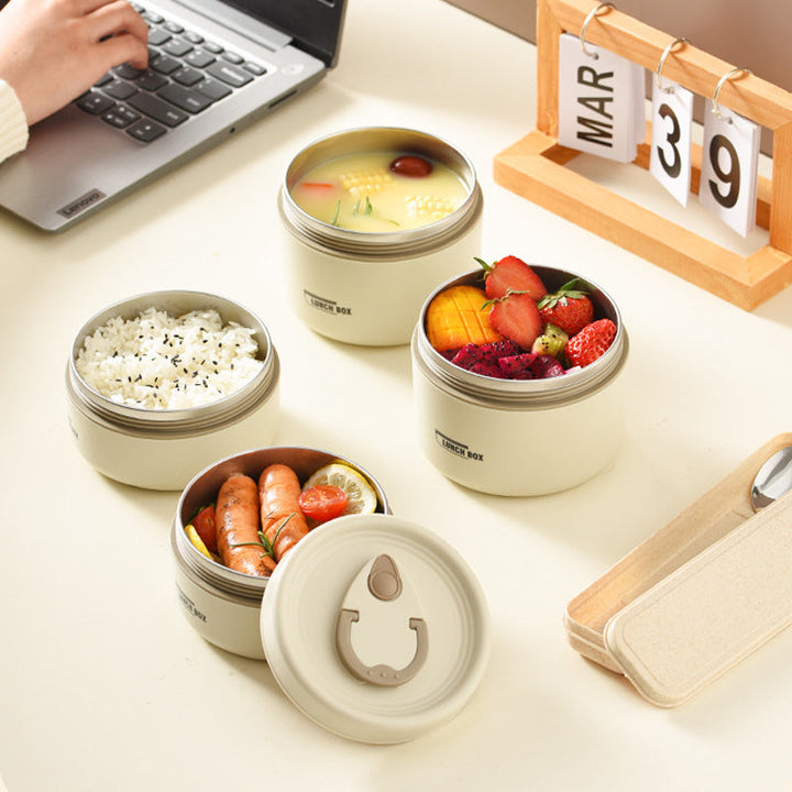 Open insulated stainless steel lunch container set, revealing spacious compartments for meal prep