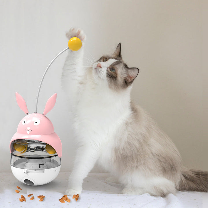 Tumbler cat toy dispenses treats, encouraging active play and mental stimulation