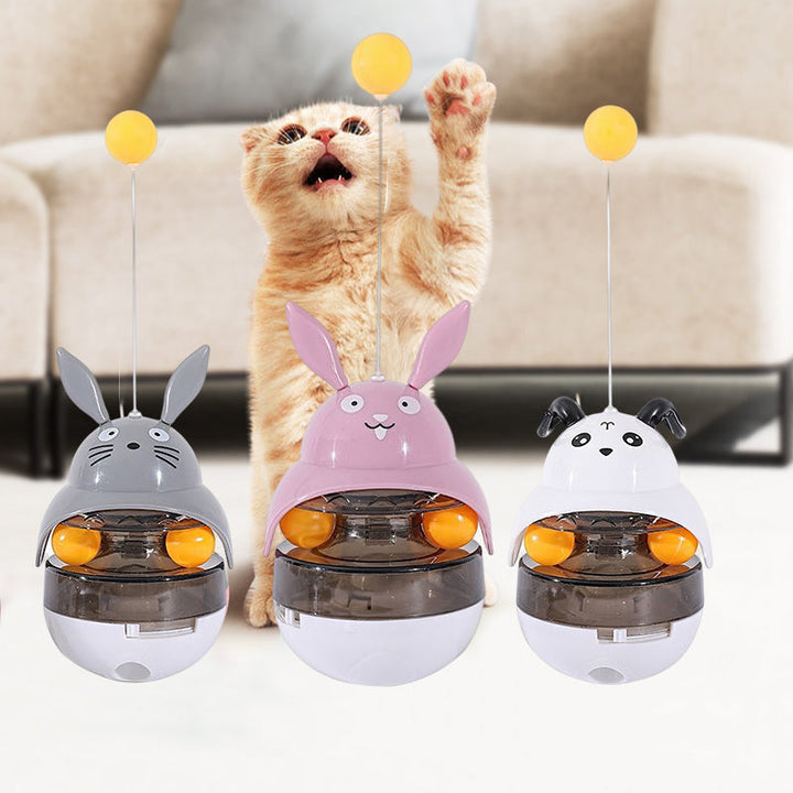 Close-up of interactive cat treat dispenser with treats, promoting healthy eating
