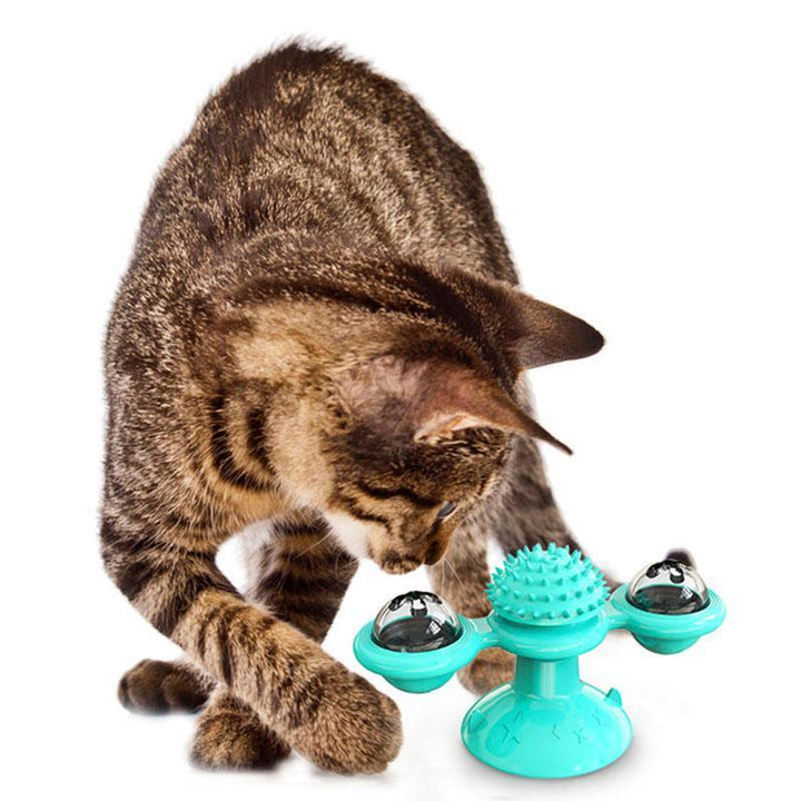Interactive pet toy: Windmill for cats, with suction cup and compartments for treats or catnip