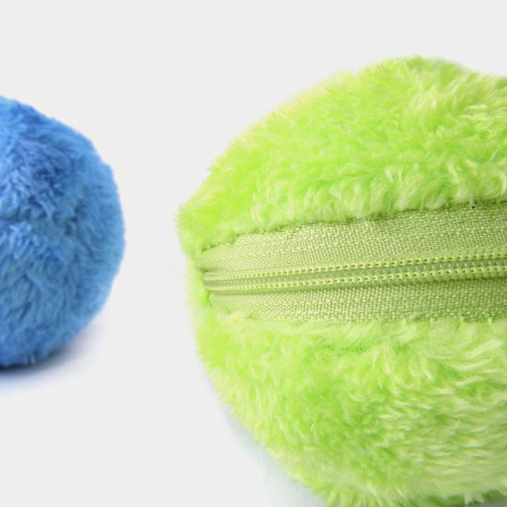 Multi-functional pet toy: an electric rolling ball with a soft, interchangeable plush cover for cleaning.