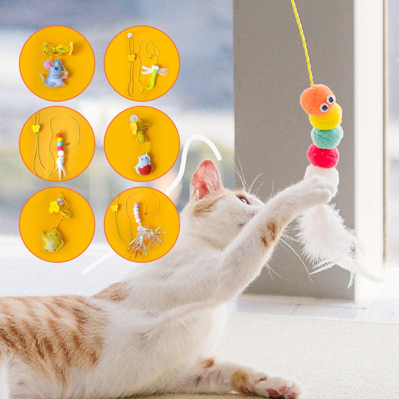 Close-up of a cat's paw reaching for the plush mouse on the interactive hanging toy, promoting exercise