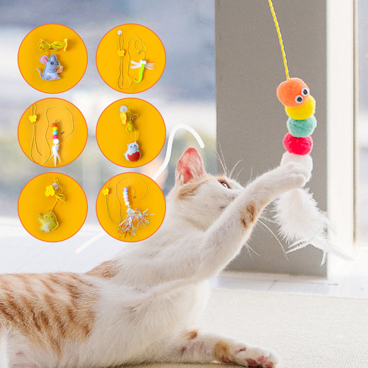 Close-up of a cat's paw reaching for the plush mouse on the interactive hanging toy, promoting exercise
