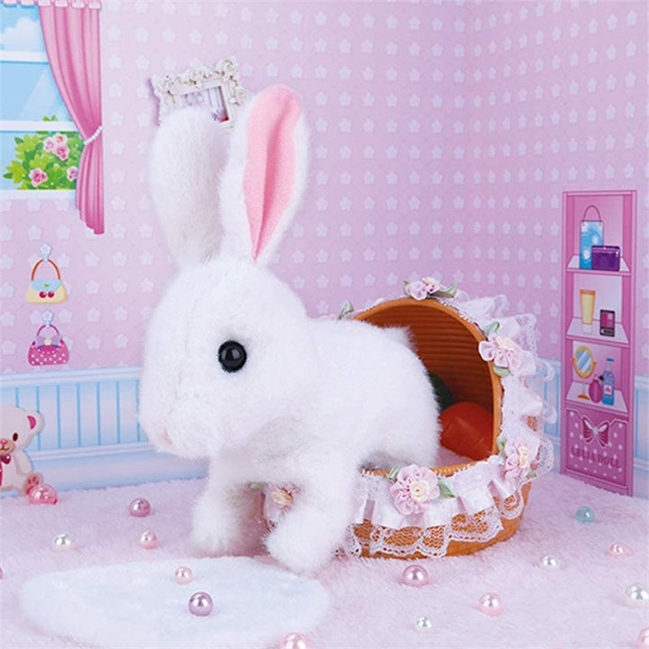 Child happily playing with a musical walking plush bunny, an engaging kids' gift