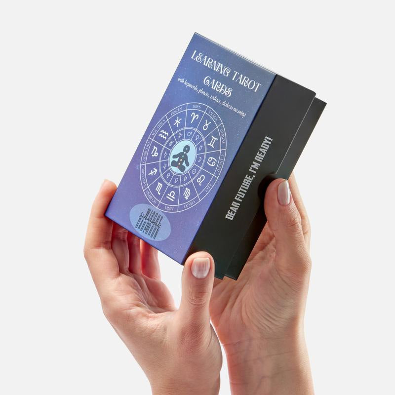 Hand holding an Intuitive Tarot Card, demonstrating its size and feel for spiritual tools & witchcraft.