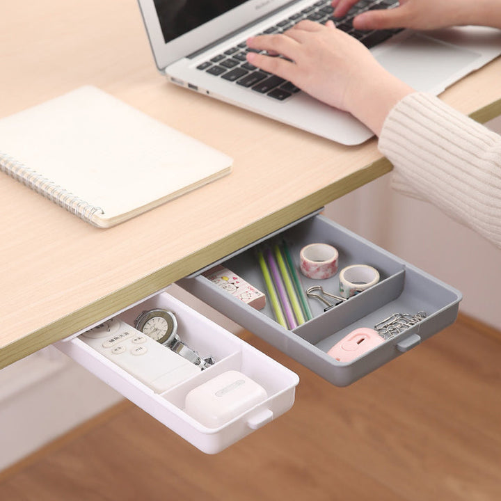 Compact hidden storage drawer for desk, black, keeping workspace clutter-free and organized.