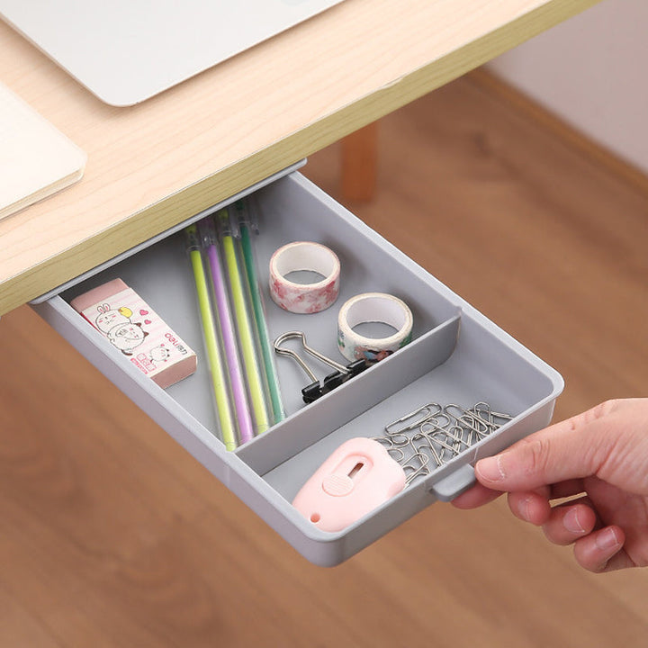 Desk organizer with hidden drawer function, white, for discreet storage of small items.