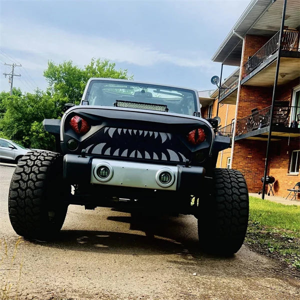 Jeep Wrangler with Beast Eyes perforated headlight decals; custom car accessory, black vinyl sticker