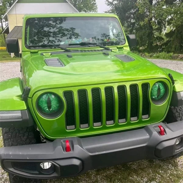 Beast Eyes perforated headlight decal applied to a Jeep, emphasizing the 'beast' look; Jeep accessory