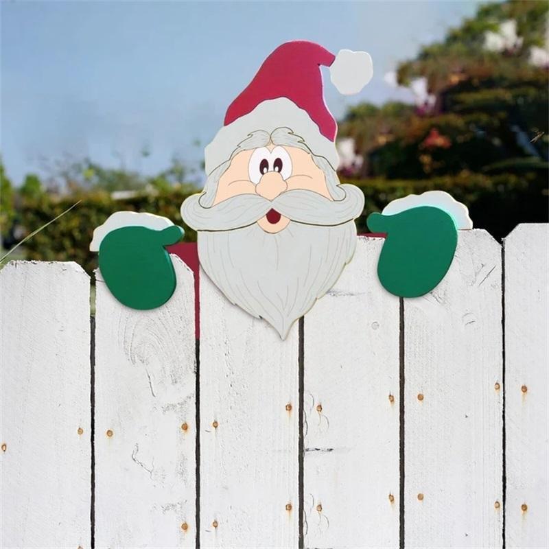 Playful elk Christmas fence peeker, charming outdoor holiday yard decoration