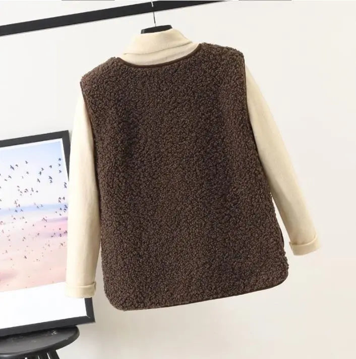 Beige sleeveless vest for women, featuring a relaxed fit, ideal for versatile outerwear styling.