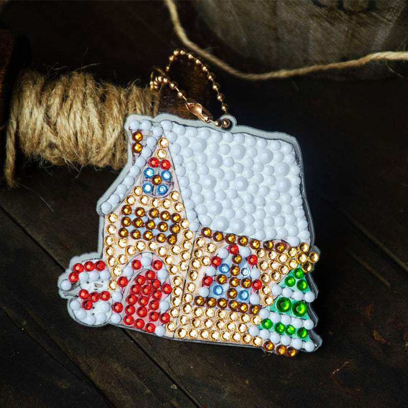 Finished set of sparkling Christmas diamond painting keychains and stickers