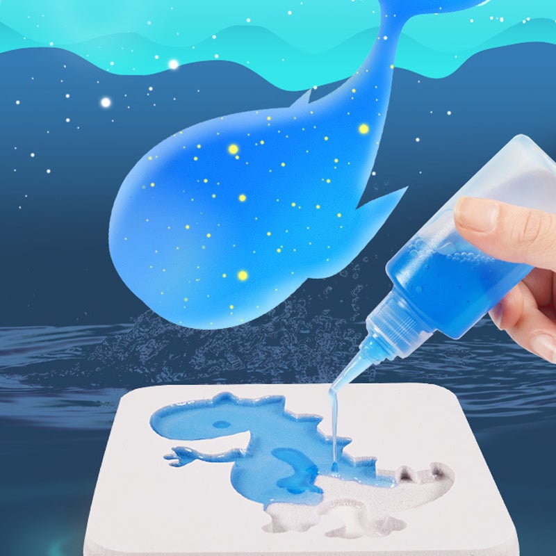 Close-up of a child's hands creating shapes with aqua gel from the DIY sensory toy set, engaging playtime