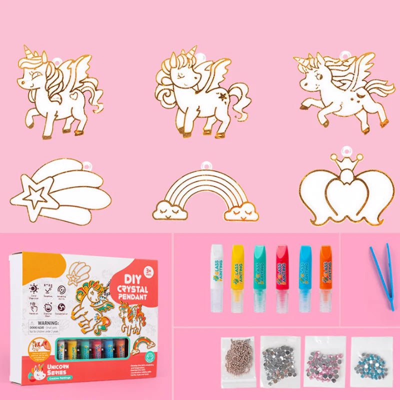 Tabletop view of the Kids Crystal Art Kit accessories: tools, crystals, and painting board