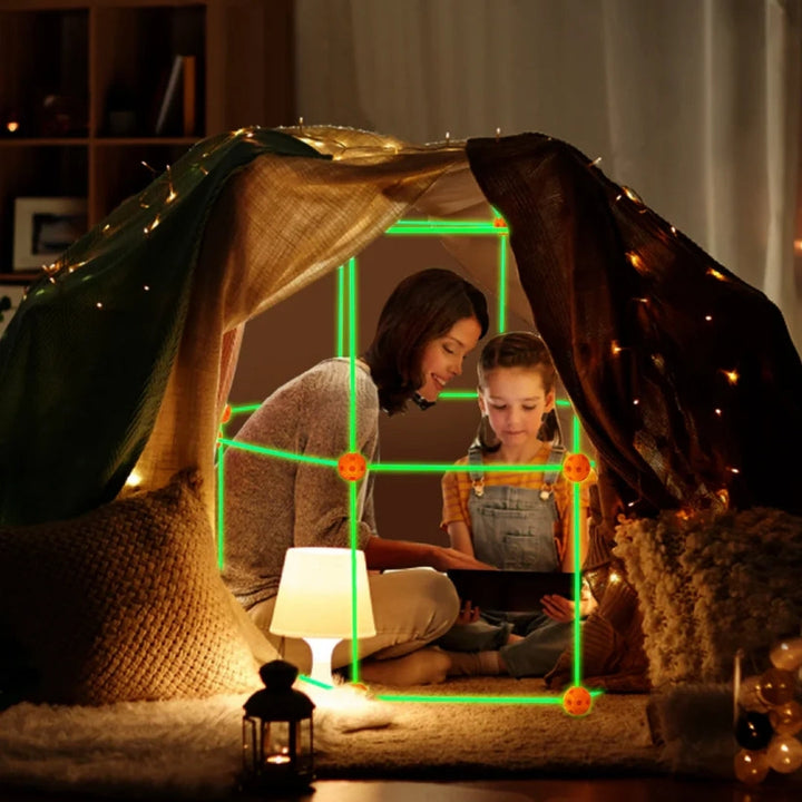 Children building a creative fort with poles and connectors, adding a tent. Encourages imagination and play.