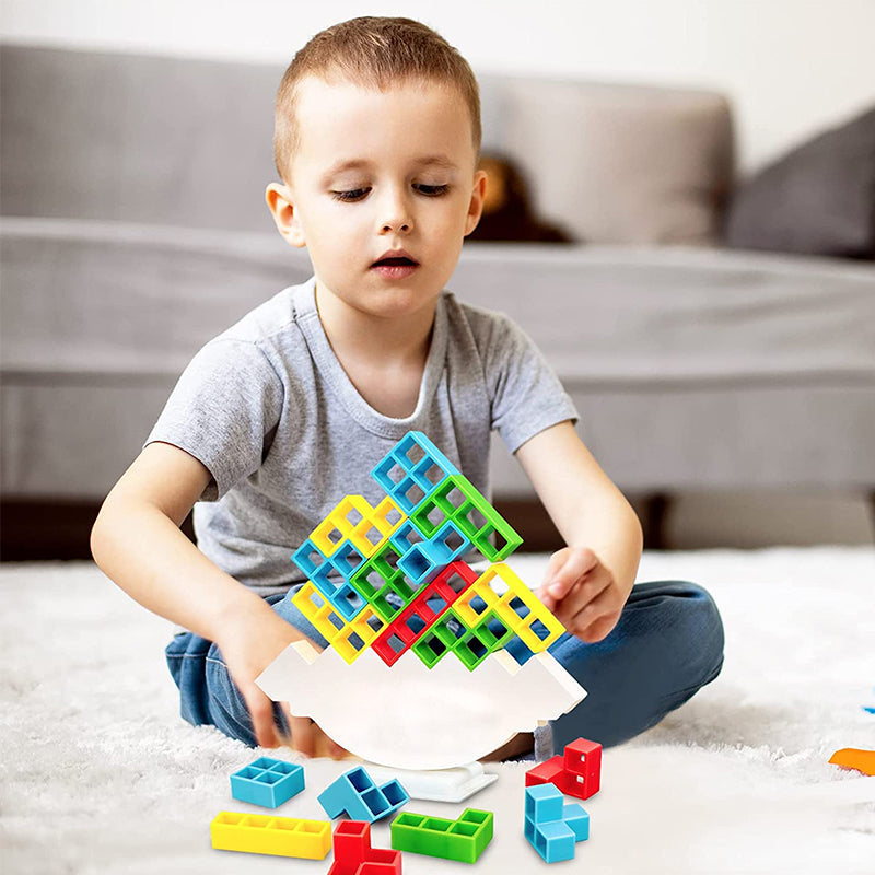 Vibrant Swing Stack-Up Balance Toy in green and orange, a durable ABS plastic kids' toy.