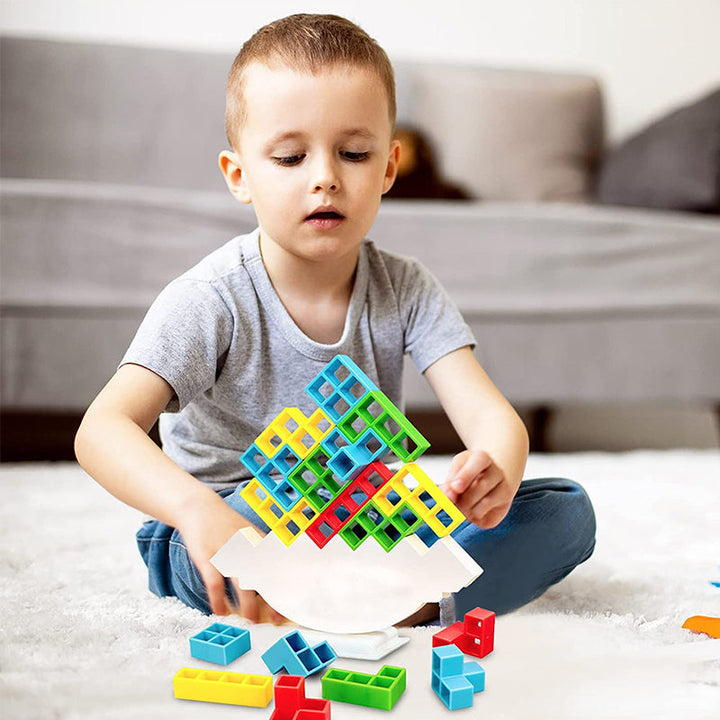 Vibrant Swing Stack-Up Balance Toy in green and orange, a durable ABS plastic kids' toy.