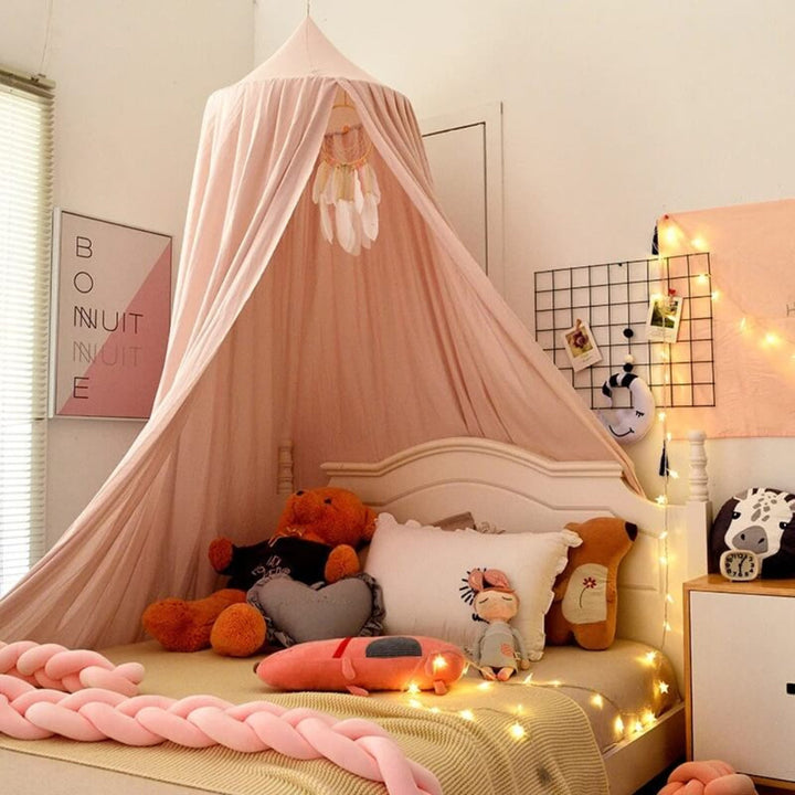 Kids' enchanting white canopy bed net, perfect for magical play & cozy sleep in any child's room.