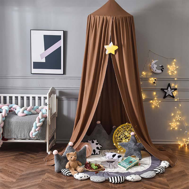 White bed net for children, a versatile hanging canopy that doubles as a fun play tent.