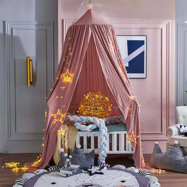 Hanging polyester bed net, ideal for a child's bedroom or nursery, creating a magical play tent.