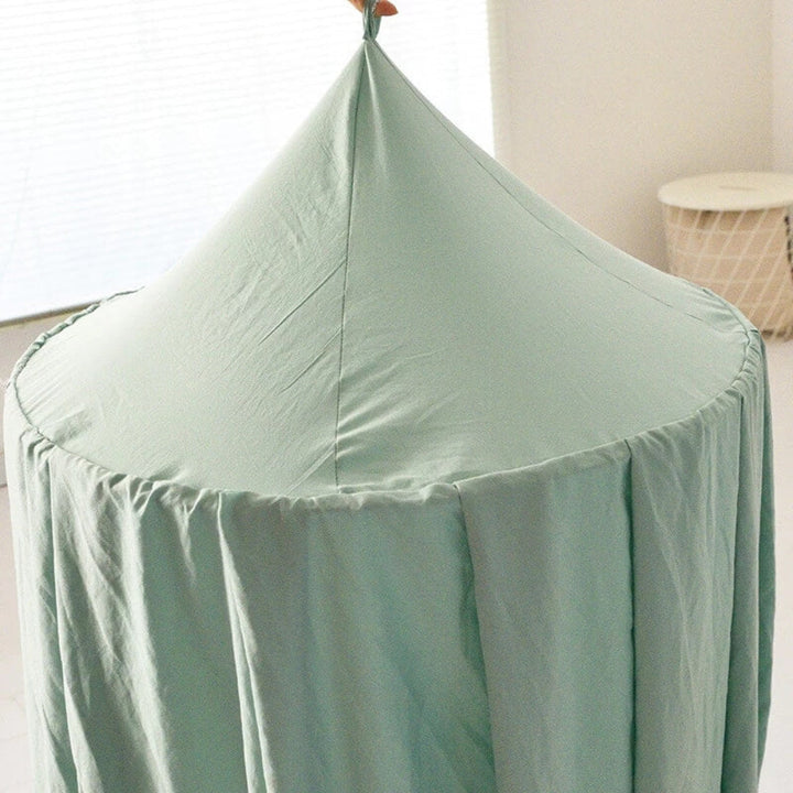 Magical bed canopy for kids, a soft polyester net providing a cozy space for imaginative play.