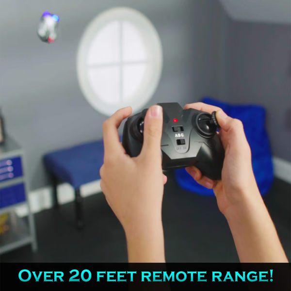 Gravity-defying RC car toy climbing upside down on a ceiling. Innovative remote control electric car for kids.