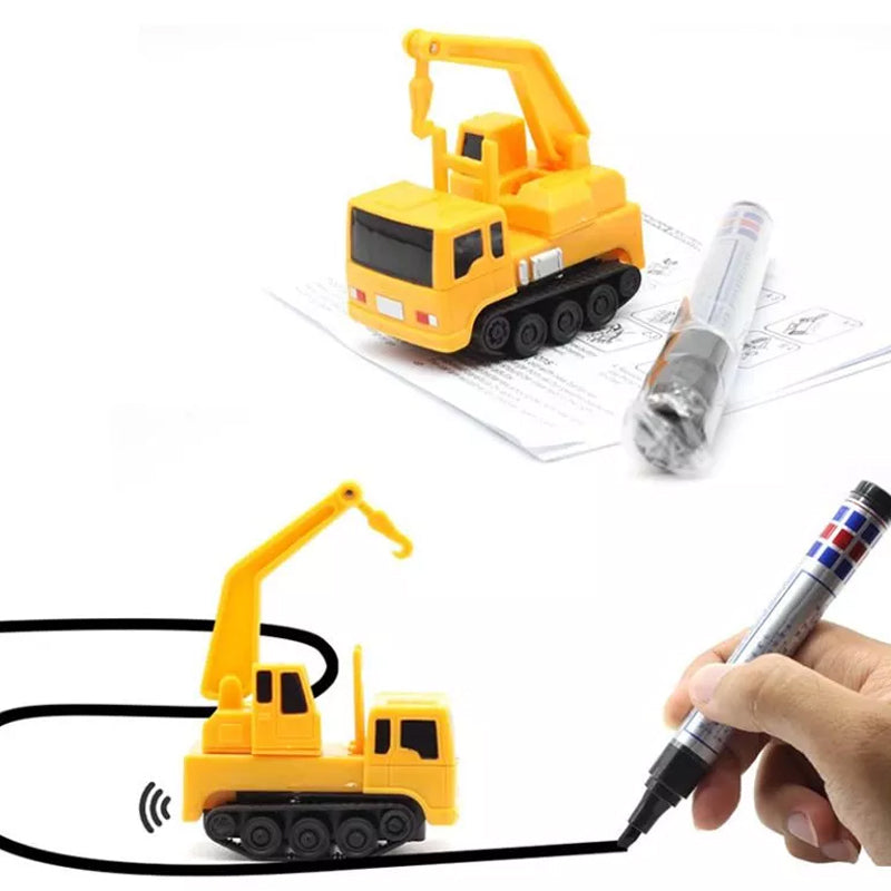 Yellow inductive toy car for kids, interactive, following a drawn black line