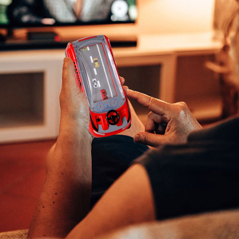 Detail of a car on the Kids' Interactive Adventure Game track, moving through a bridge or ramp challenge