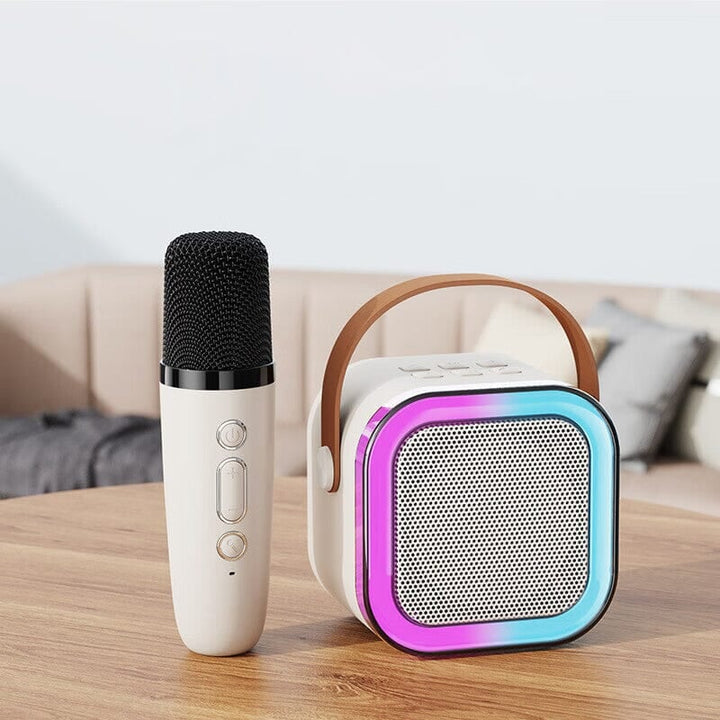 Compact kids karaoke machine with Bluetooth speaker & wireless mics, ideal for portable fun.