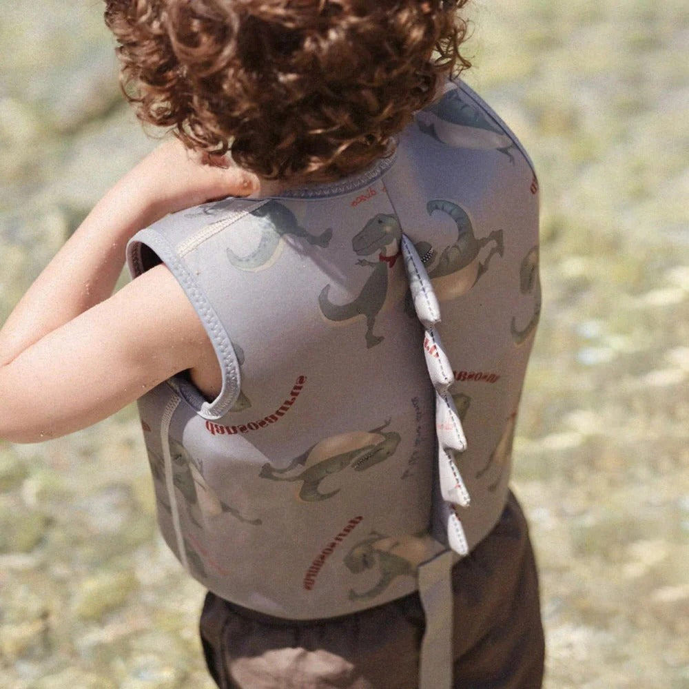 Child's neoprene swim vest and floatie, a reliable swimming aid for water safety and confidence in young swimmers.