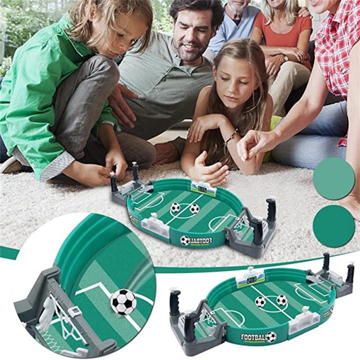 Kids playing interactive soccer tabletop game, red & blue teams, scoring goals, family fun playtime