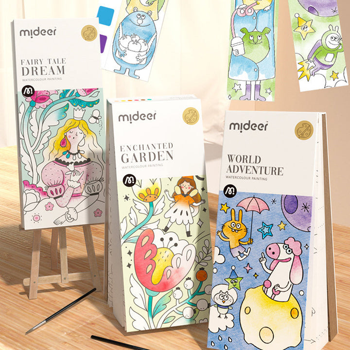Kids' portable watercolor painting book set open, showing vibrant colors and brush