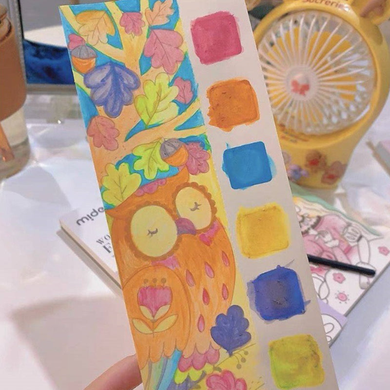 Fun painting activity for kids: watercolor book with pre-printed outlines
