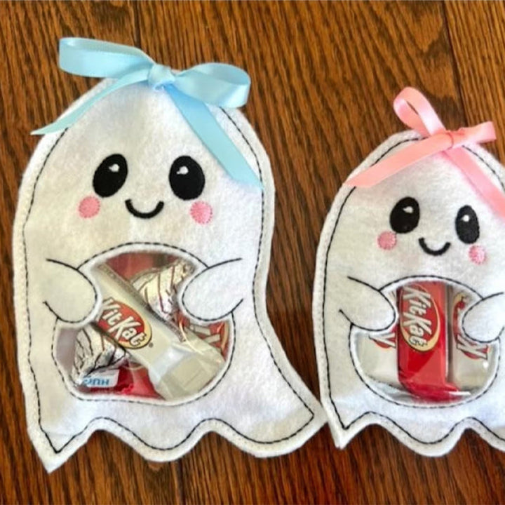 Collection of empty Halloween treat bags featuring friendly ghost and classic pumpkin illustrations