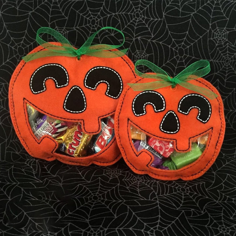 Group of excited children holding their personalized spooky Halloween candy and treat bags