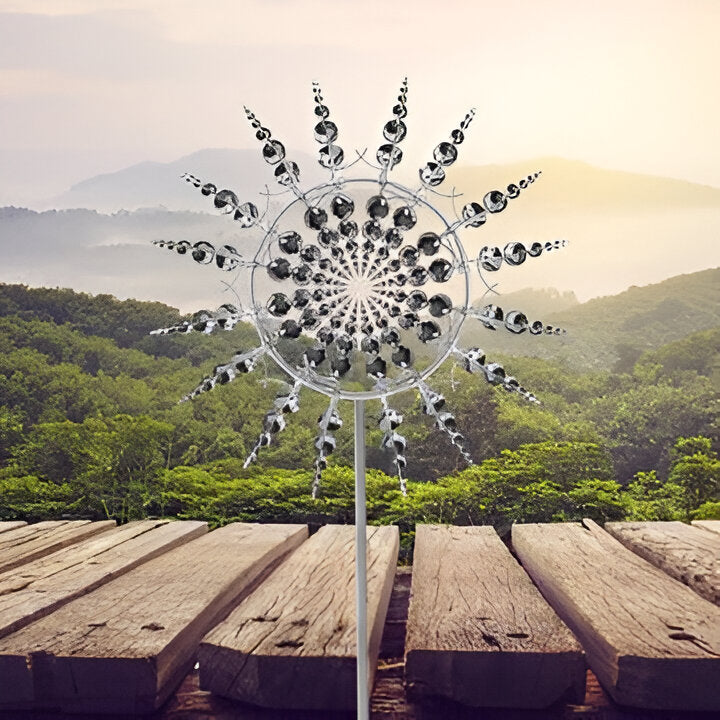 Vibrant kinetic metal wind spinner, a dynamic yard ornament and garden decor for any outdoor space.