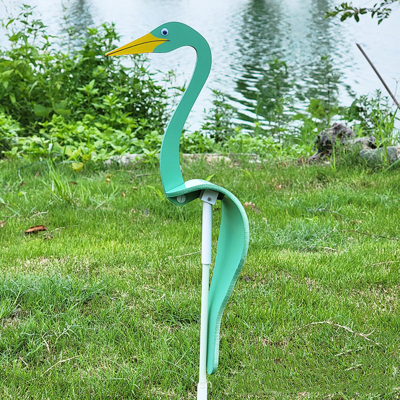 Decorative flamingo wind spinner, showcasing intricate kinetic swirl details, perfect for patios