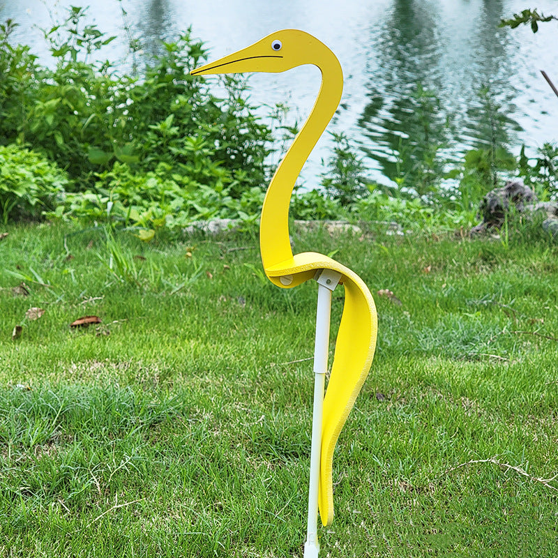 Gift idea: a charming flamingo kinetic wind spinner for an outdoor garden and home decor