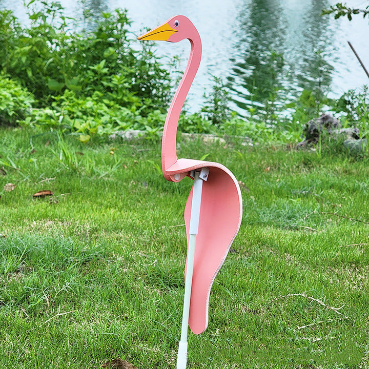 Elegant flamingo wind spinner, captures the breeze with its graceful kinetic swirl motion