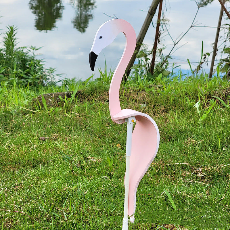 Large kinetic swirl flamingo wind spinner, a vibrant statement piece for any garden or yard