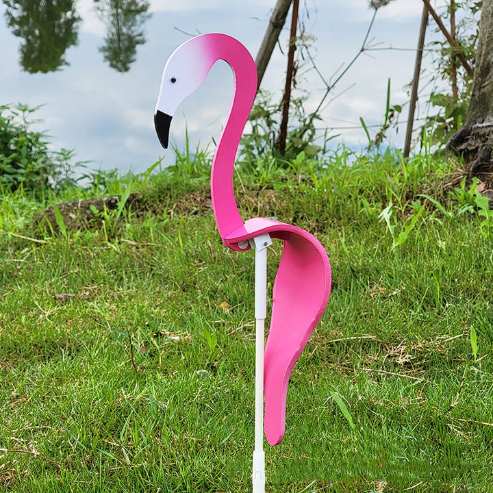 Metal art flamingo wind spinner, durable and decorative, enhances any outdoor garden space